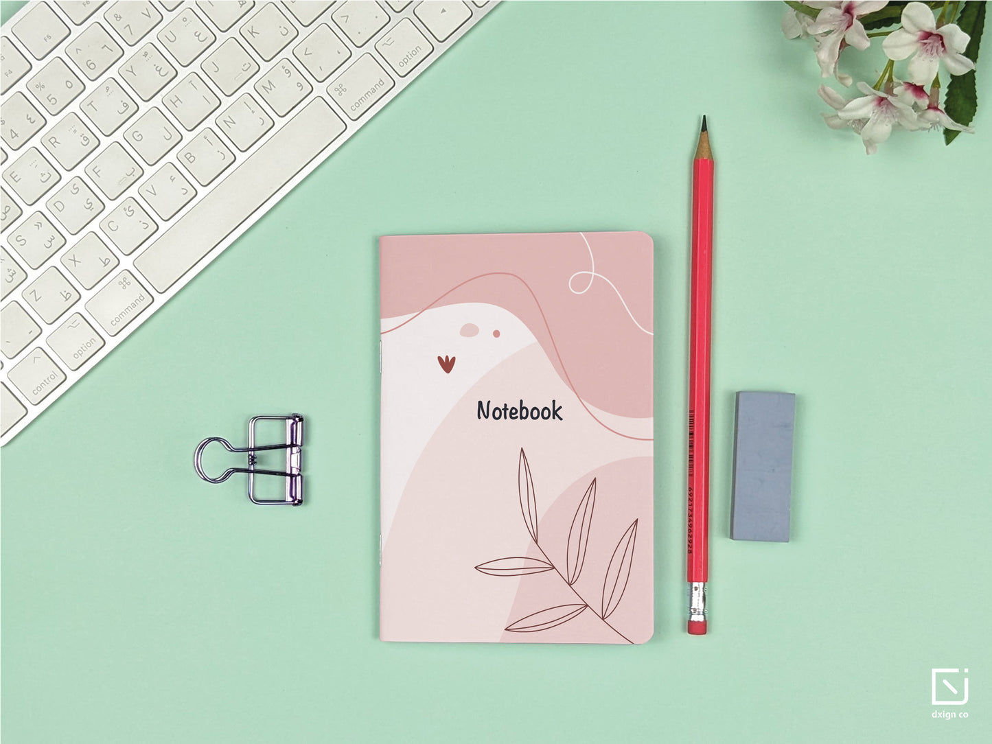 sweet rode abstract pink leaves design personalised small notebook on a desk