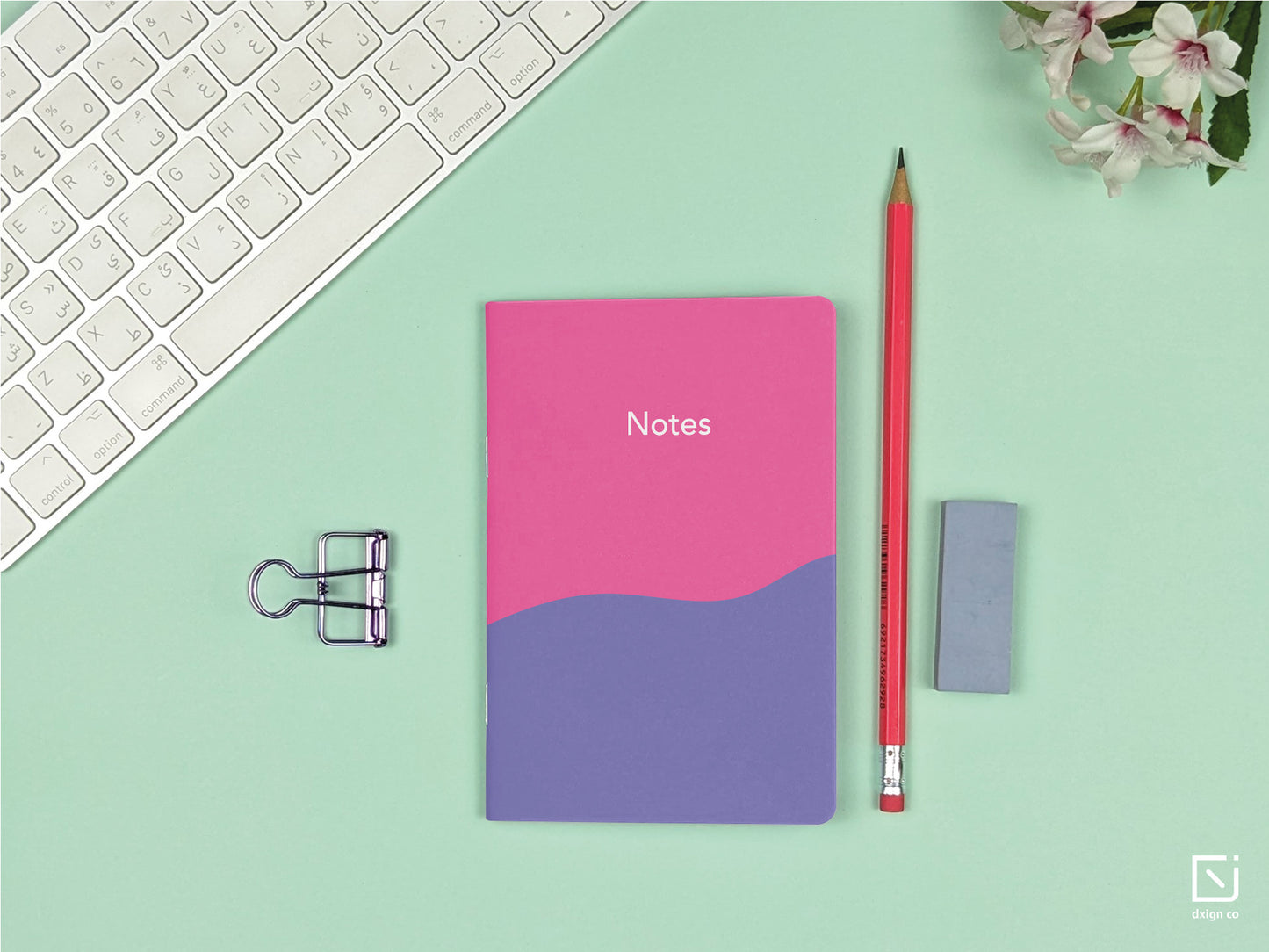 blue tango abstract pink purple white design personalised small notebook on a desk 