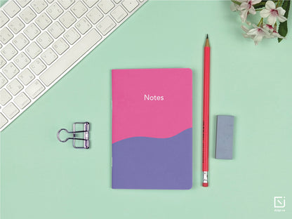 blue tango abstract pink purple white design personalised small notebook on a desk 