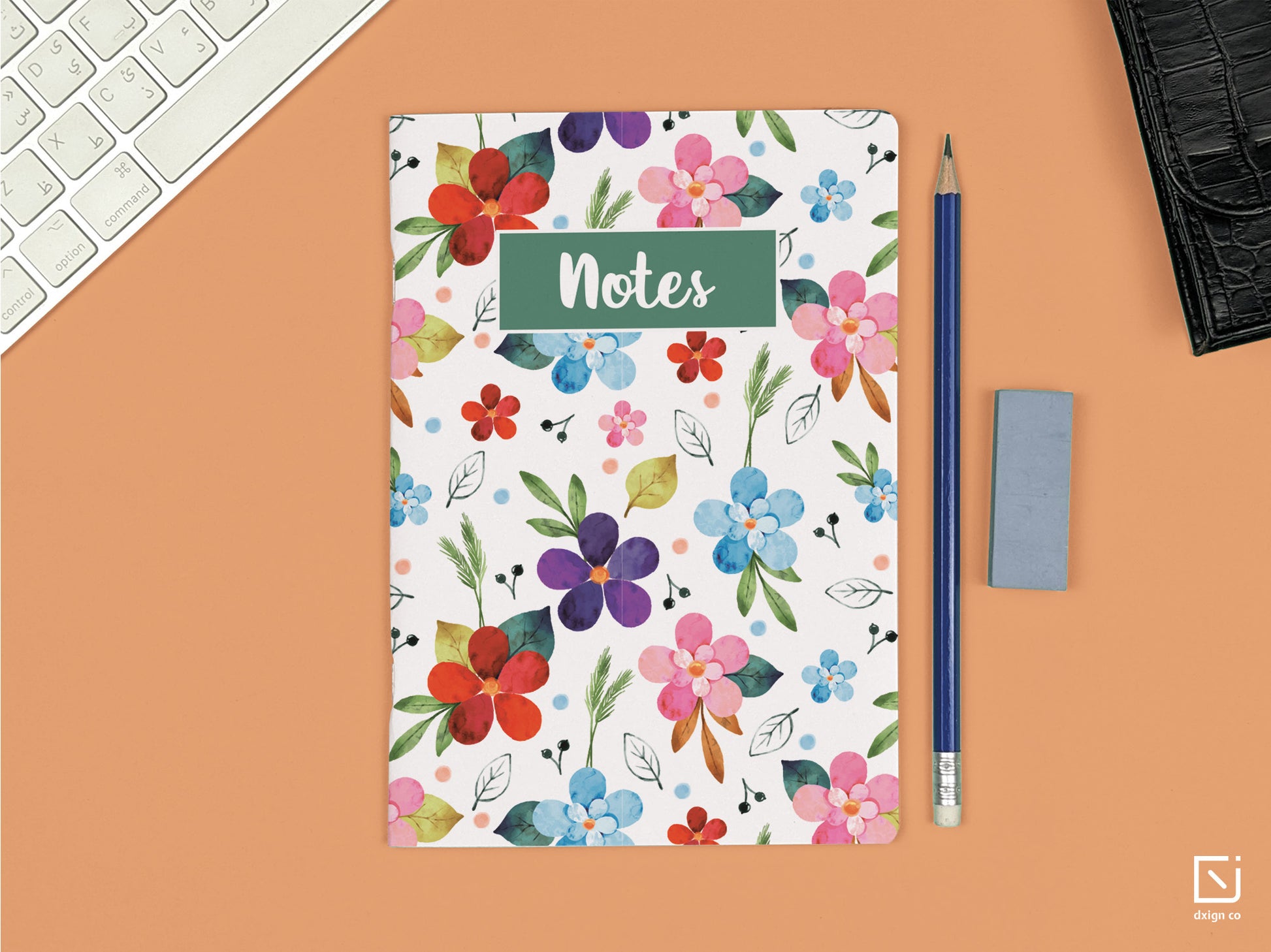 pentunia vibrant coloured flowers design personalised notebook on a desk 