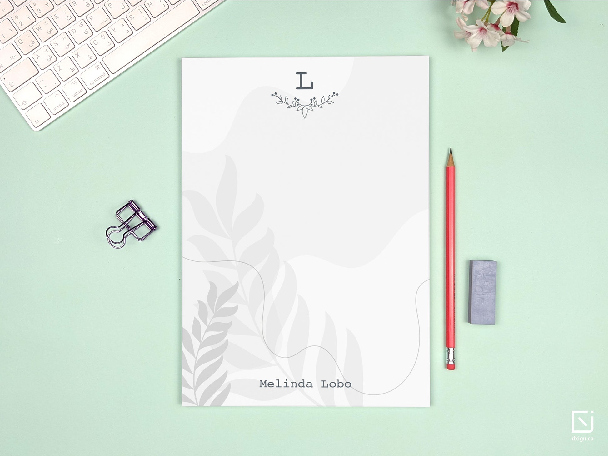 floral leaves monogram single initial with name personalised large notepad on a desk