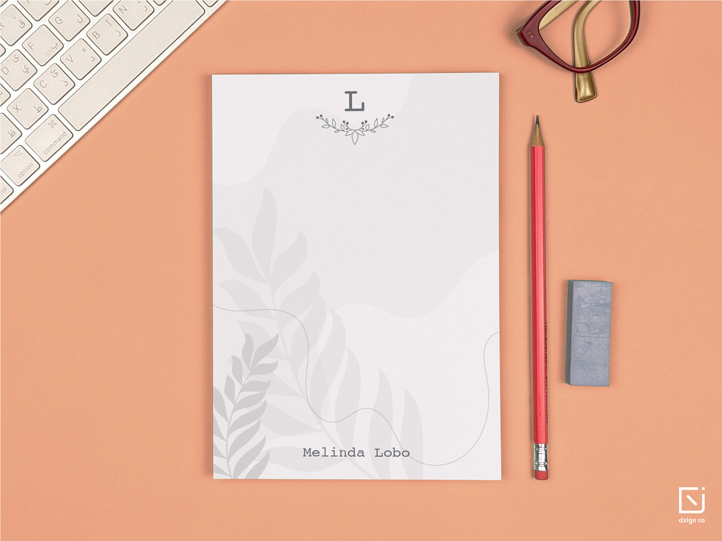 floral leaves monogram single initial with name personalised notepad on a desk