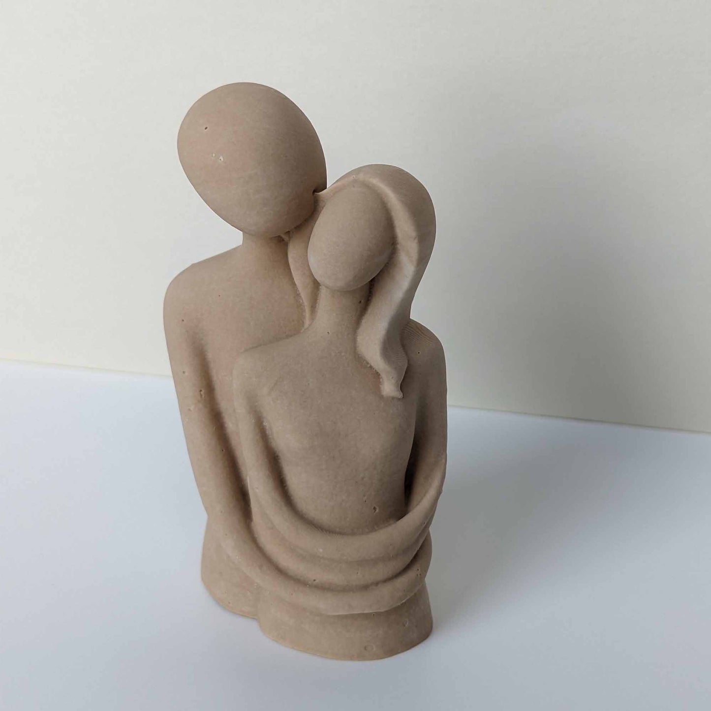 Hugging Couple Sculpture