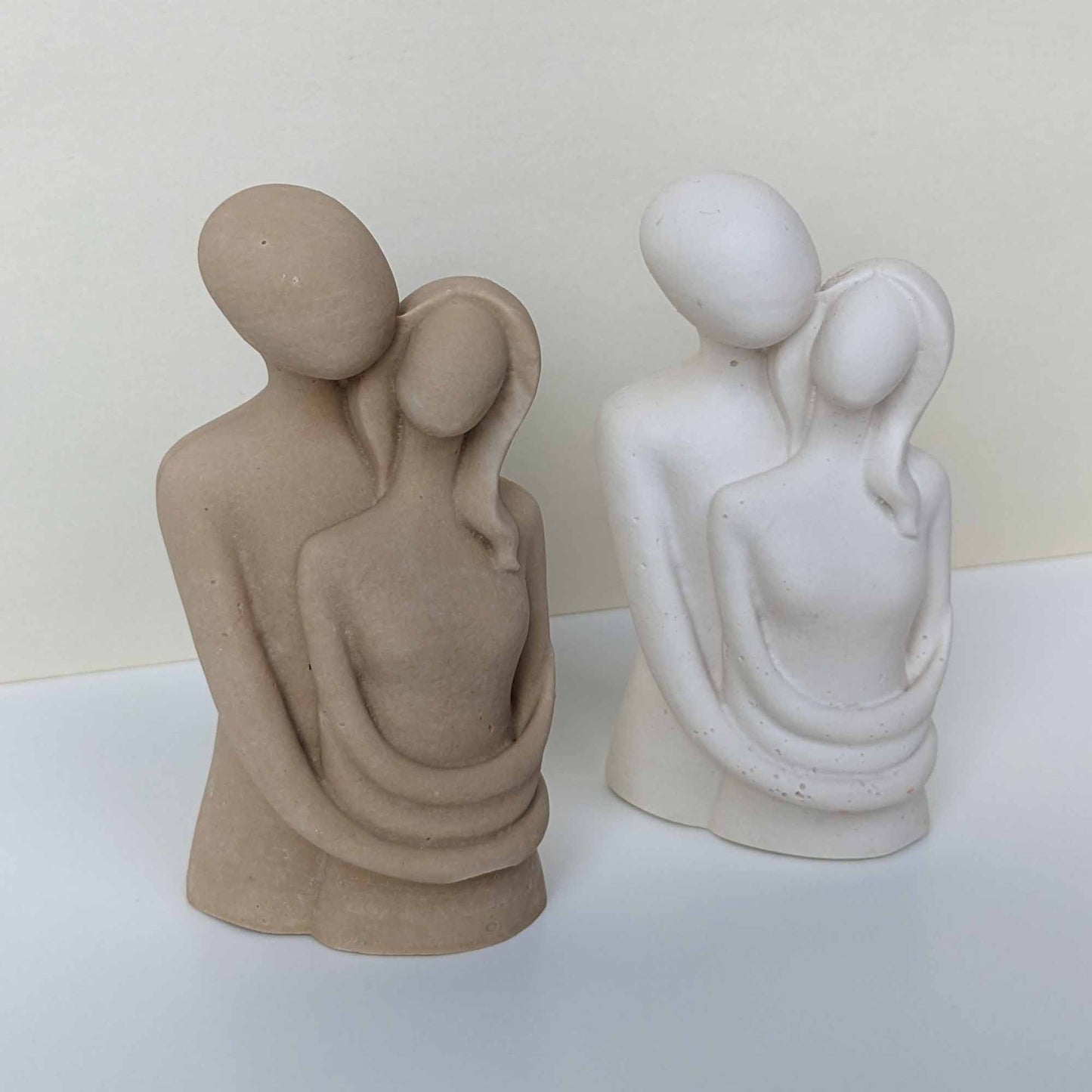 Hugging Couple Sculpture